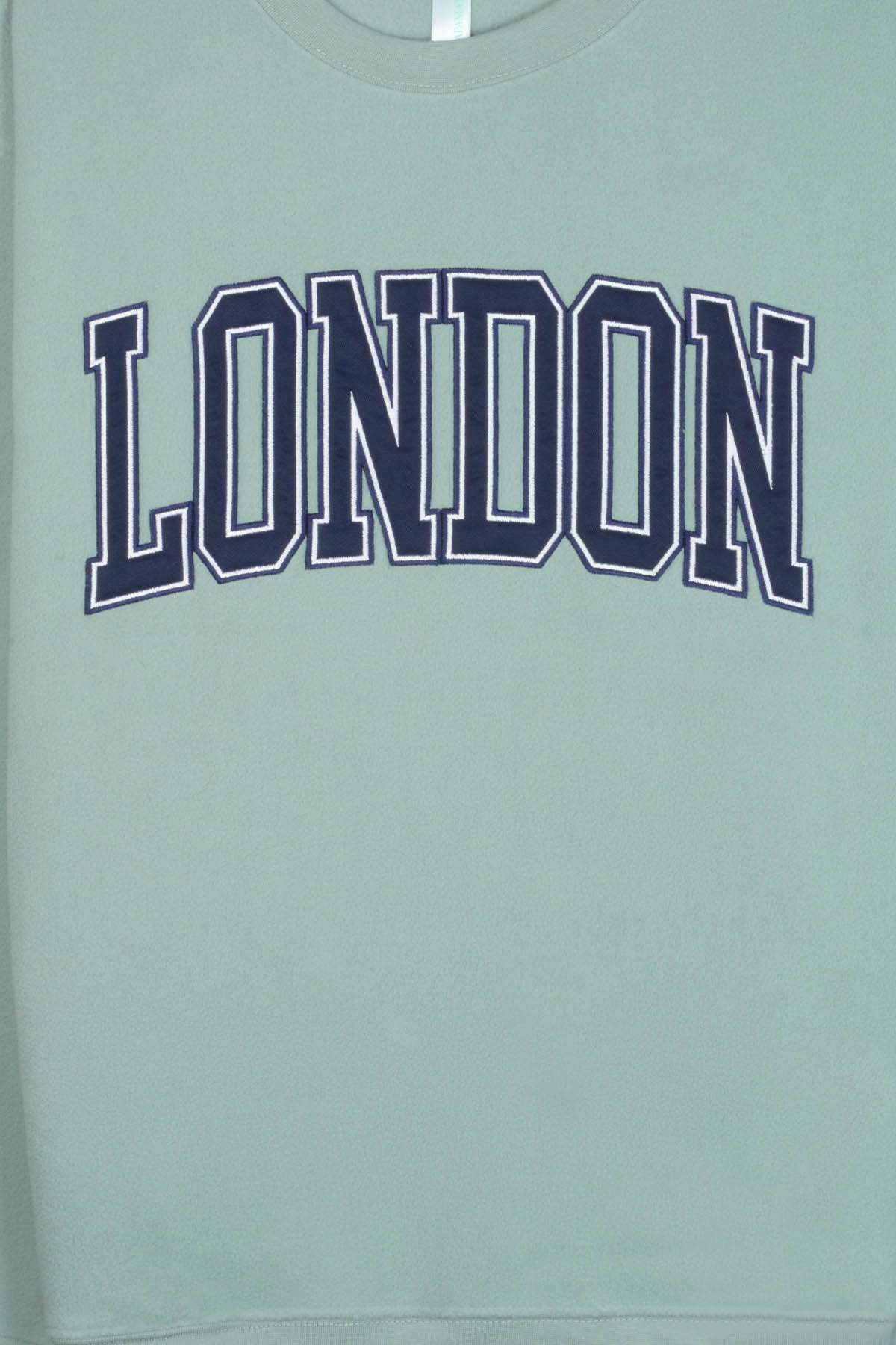Polar fleece sweatshirt for adults featuring 'LONDON' embroidery and side pockets - SINGA SAGE.